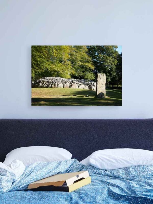 Example of a canvas print with the Cairn and Standing Stone design hanging on a bedroom wall