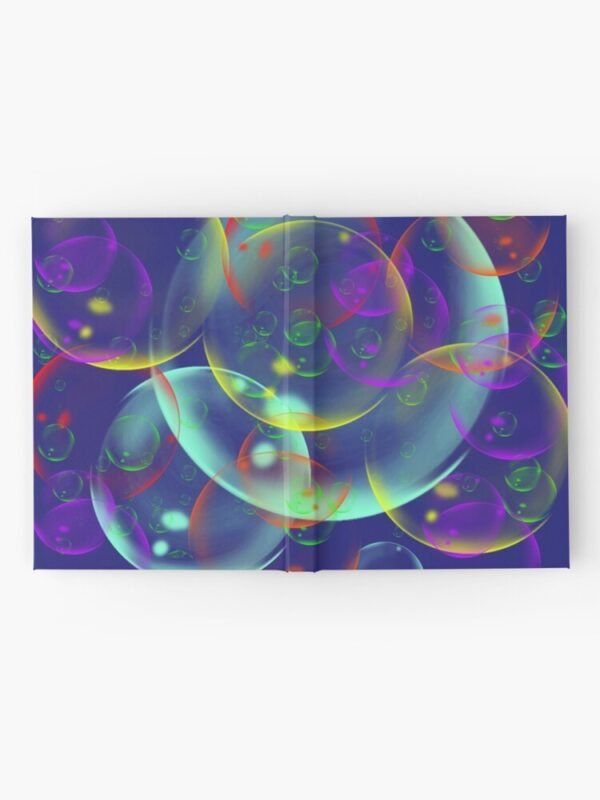 A hardcover journal with an image of different sized, and coloured bubbles on its cover