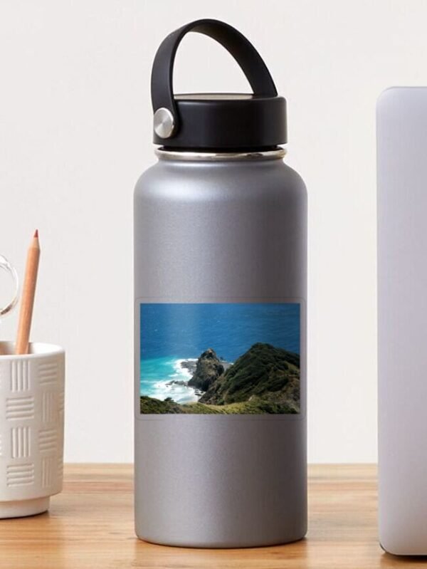 A water bottle sporting a Where The Spirits Enter The Underworld transparent sticker.
