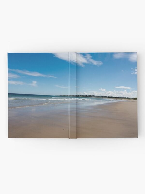 A hardcover journal with a photograph of an expansive sandy beach at Lossiemouth on its cover