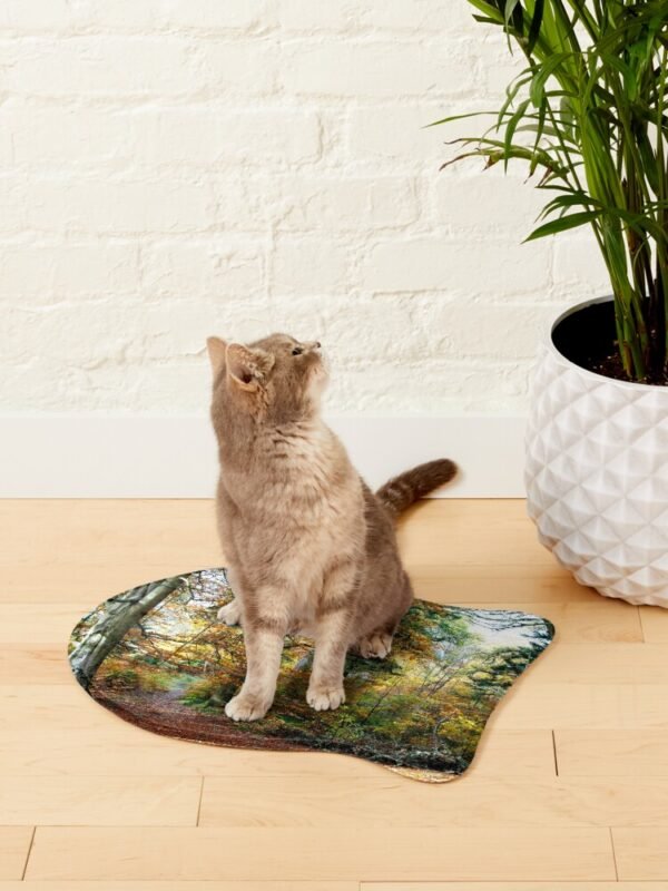 Amongst The Memories Fish Shaped Pet Mat with a cat sitting on the mat