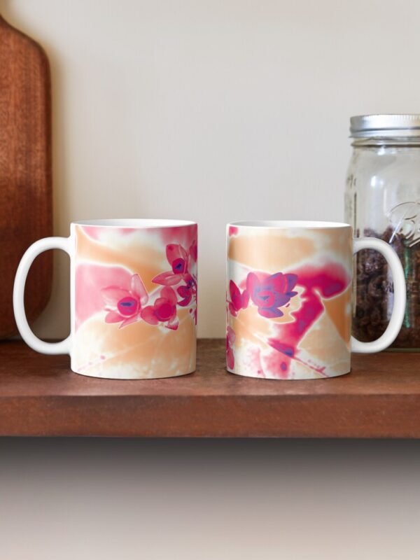 Alternative Hypericum classic mugs on a shelf - one mug has the handle to the left, the other to the right.