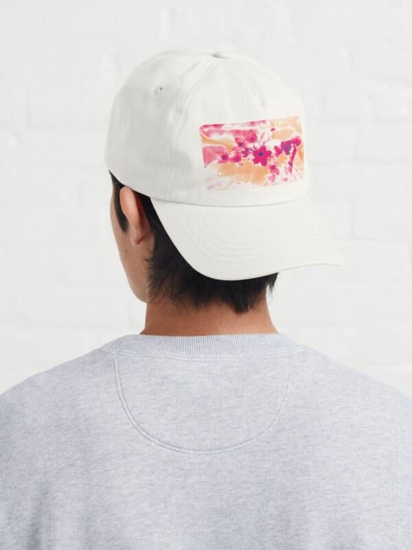 Alternative Hypericum dad hat on a young male with the design and peak to his back
