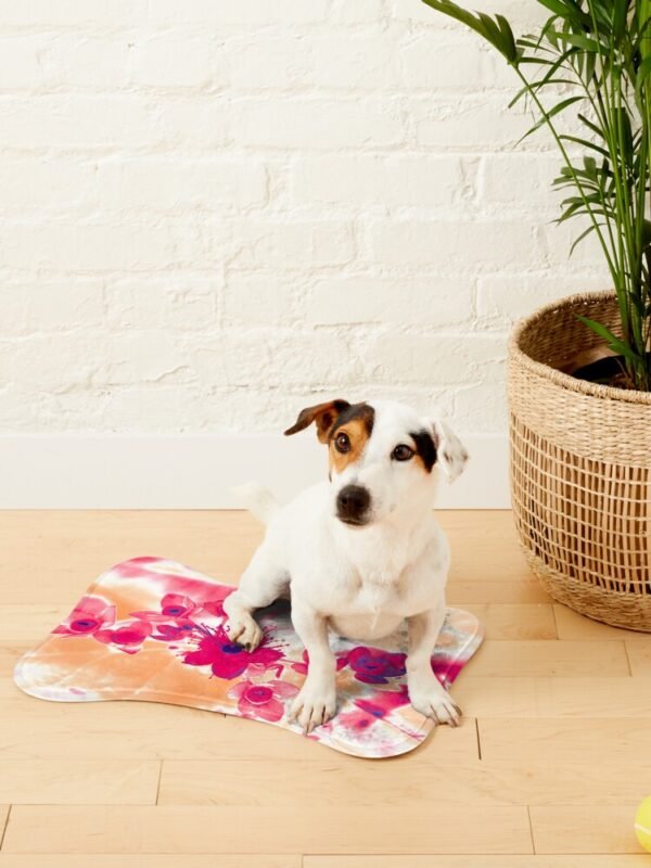 Alternative Hypericum bone shaped mat with a small dog sitting on it