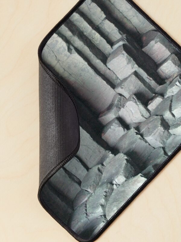 Basalt Columns Mouse Mat with the corner curled over to show the backing