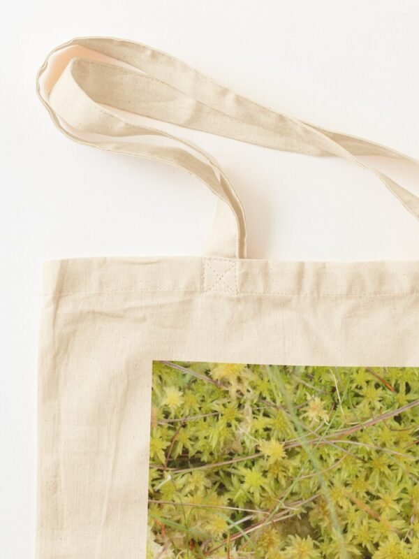 A Bed of Sphagnum Moss cotton tote bag, showing the stitching attaching the handles to the bag.