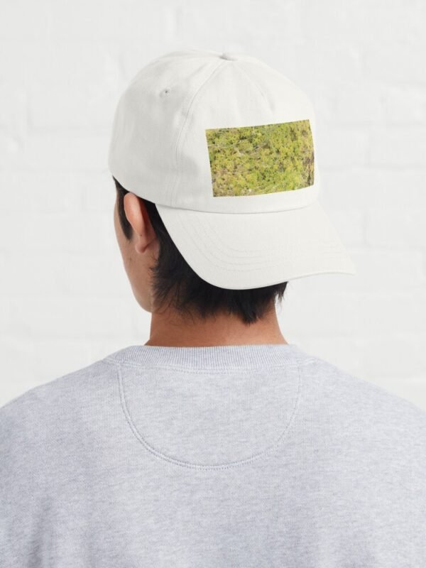 A young male wearing A Bed of Sphagnum Moss Dad Hat - with the hat back to front