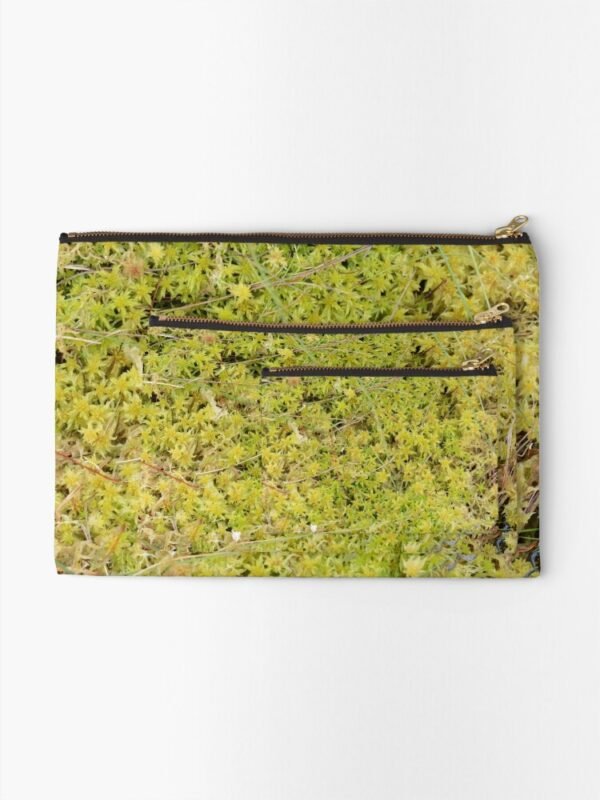 A Bed of Sphagnum Moss zipper pouches - three different sizes of pouch all lying on top of each other