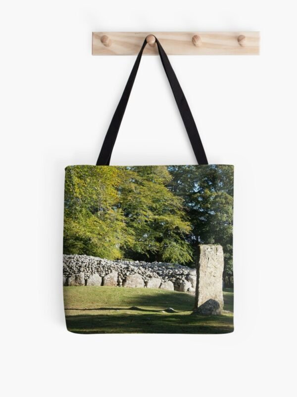 Cairns and Standing Stone All Over Print Tote Bag hanging on a set of 4 wooden pegs