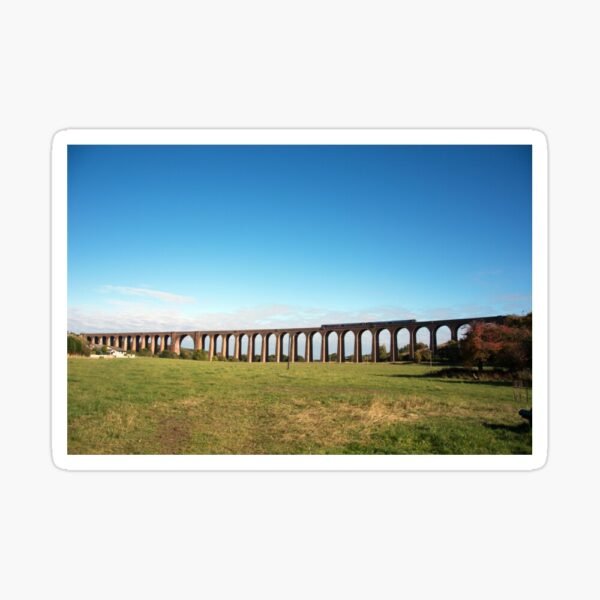 A sticker with a photo of a train running along the Culloden viaduct.