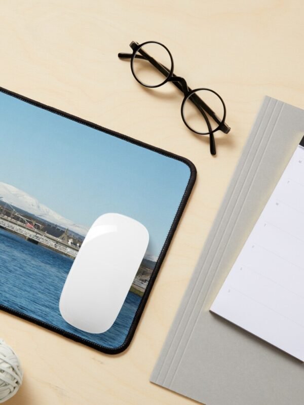 Ben Wyvis Mouse Mat with a white mouse sitting on it and next to various items of stationery