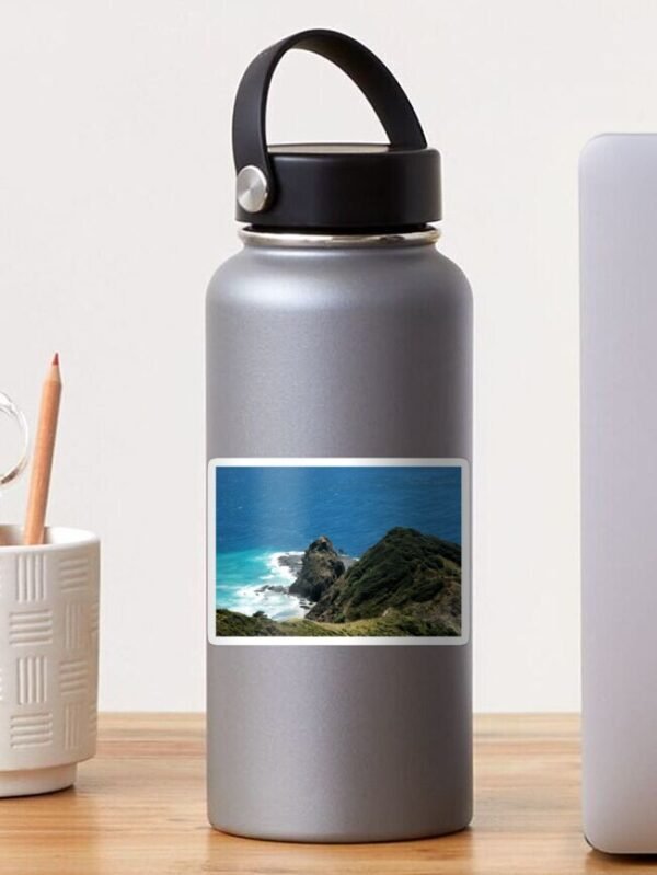 A water bottle sporting a Where The Spirits Enter The Underworld sticker.