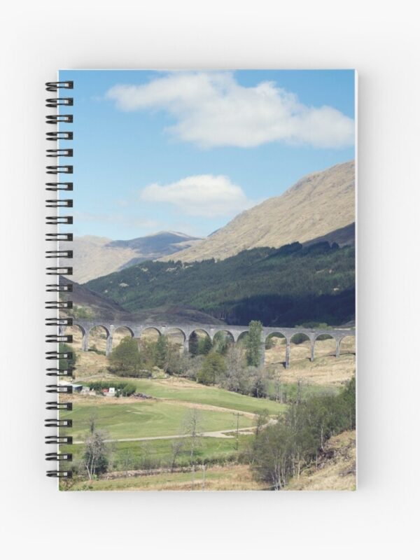 A spiral bound notebook with an image of the Glenfinnan viaduct on its front cover
