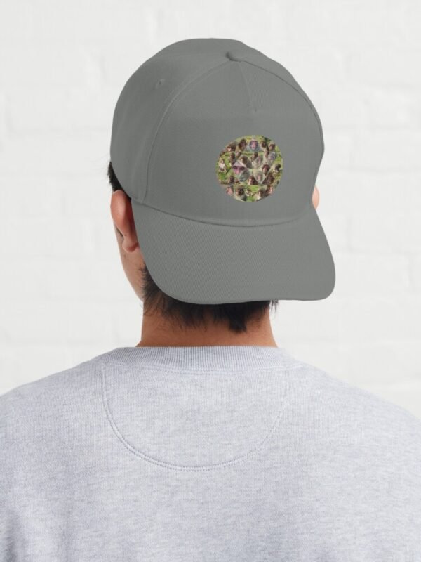 A baseball cap sporting the Many Faces Of A Snow Monkey design.