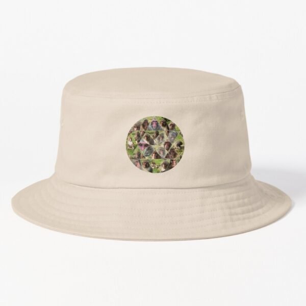 A bucket hat sporting the Many Faces Of A Snow Monkey design.