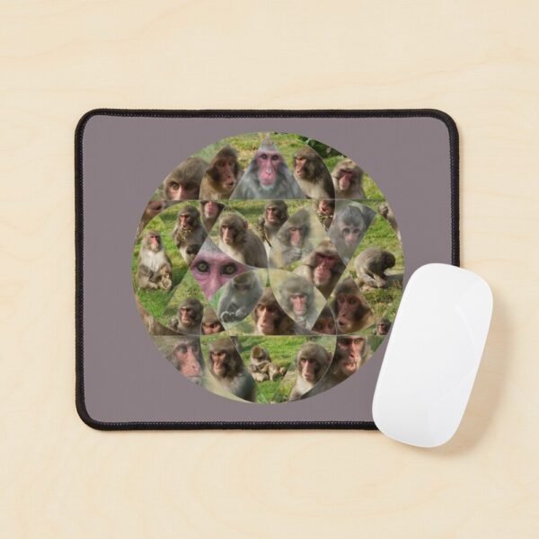 A mouse mat/pad with the Many Faces of A Snow Monkey design.