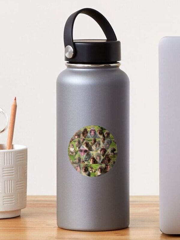 A water bottle sporting the Many Faces Of A Snow Monkey transparent sticker.
