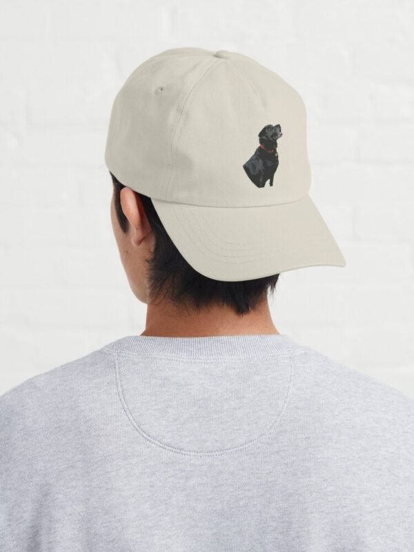 Adoration of a Black Labrador Dad Hat worn back to front by a young male
