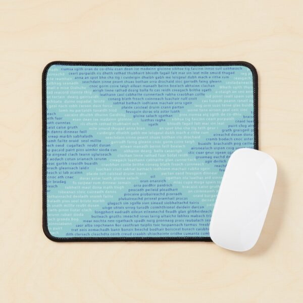 A mouse mat/pad with Gaelic words in the shape of a saltire on its front